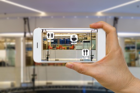 Application of Augmented Reality or AR for Navigation Concept in Mall Looking for Coffee Shop, Restaurant, and Restroomの写真素材
