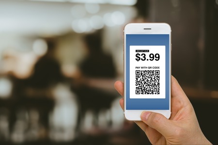 Paying for Goods and Services by Smartphone Using E-Wallet App and E-Money, Fintech Concept Paying for Goods and Services by Smartphone Using E-Wallet App and E-Money, Fintech Concept