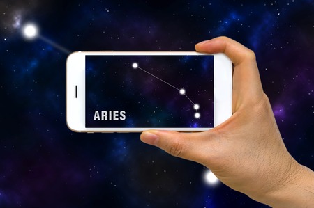 Augmented Reality, AR, of Aries Zodiac Constellation App on Smartphone Screen Conceptの写真素材