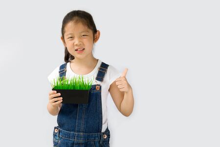 Organic Farming Concept, Asian Kid Farmer, Isolated on White Backgroundの写真素材