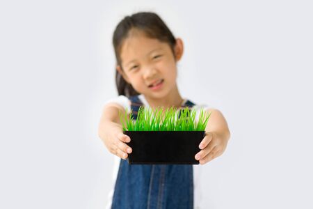 Organic Farming Concept, Asian Kid Farmer, Isolated on White Backgroundの写真素材