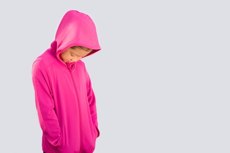 Asian Kid in Sweater Isolated on Whiteの写真素材