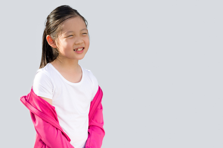 Asian Child in Sweater Isolated on Whiteの写真素材