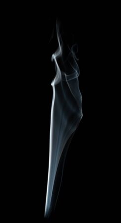 white smoke on the black background.の写真素材
