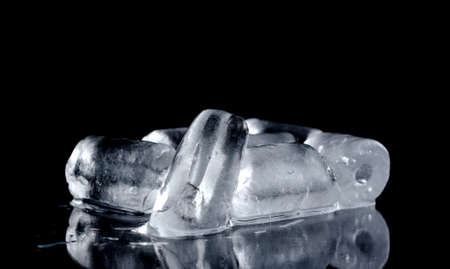 close up cubes ice dark black isolated background with copy spaceの写真素材
