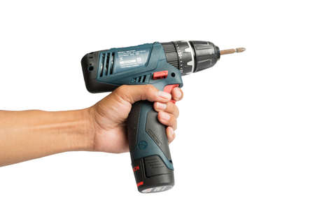 Ubon Ratchathani, Thailand -June 19,2019:Bosch power electric drill generation GSB 120 LI in isolated on white background, Close-up hand holding electric drill in isolated white backgroundのeditorial素材