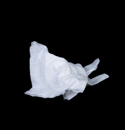 Crumpled tissue paper isolated on black background textureの写真素材