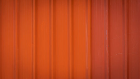 close-up old steel plate orange metal backgroundの写真素材