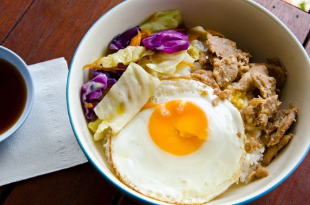 fried pork and fried eggの写真素材