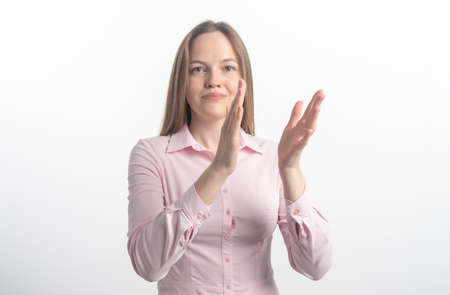 happy woman clapping hands over white background, applause of businesswoman, whiteの写真素材