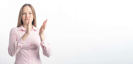 happy woman clapping hands over white background, applause of businesswoman, white, copy space, bannerの写真素材