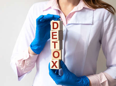 DETOX word made with building blocks, detoxication concept