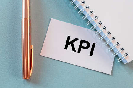 KPI acronym Key Performance Indicator word text inscription on paper sticker, office tableの写真素材