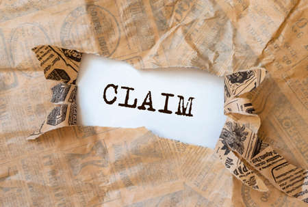 Claim word on paper, lawsuit and claims conceptの写真素材