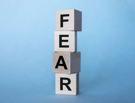 Word fear inscription. Concept of being afraid and feeling anxiety.の写真素材