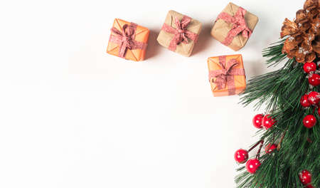 Christmas banner with fir tree branch with vibrunum and wrapped gift boxes on white banner with copy...