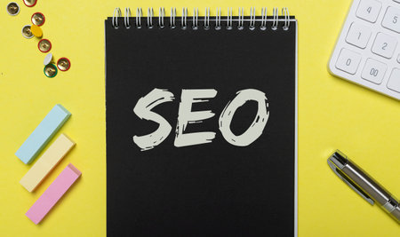 SEO acronym inscription on black and yellow background. Digital marketing.の写真素材