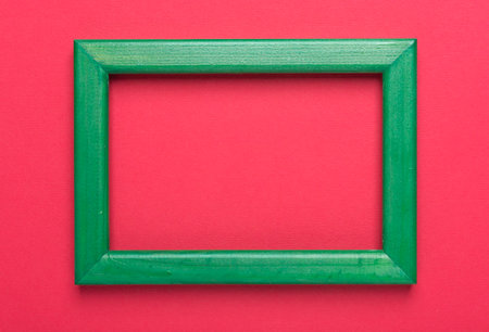 Background with place for text in red color with green frame.の写真素材