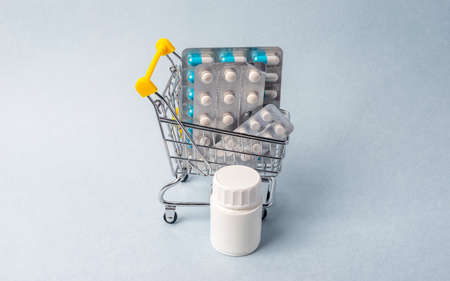 Shopping cart with blister of pills. Pharmacy.の写真素材