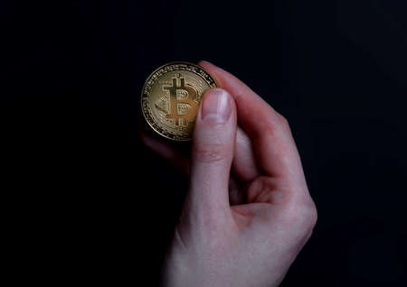 Bitcoin or BTC golden coin with sign of cryptocurrency.の写真素材