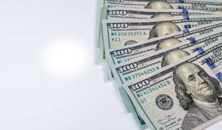 American dollars bank notes on white background with copy space.の写真素材