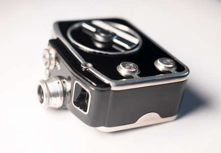 Vintage antique film photo camera with old lens.の写真素材