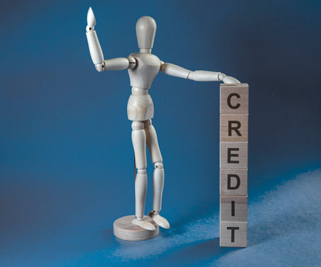 Credit word on building cubes. Enlarging of loan concept.の写真素材