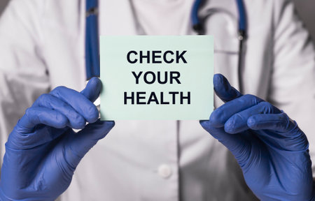 Check your health inscription on paper in doctor hands.