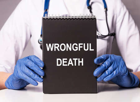 Wrongful death inscription. Medical doctor error concept.の写真素材
