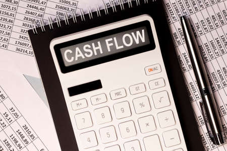 Cash flow word on calculator, cashflow inscription