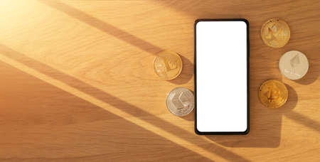 Banner for cryptocurrency ads banner with mock up phone screen, bitcoin, ethereum and copy space on wooden background.の写真素材