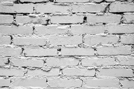 Rough brick wall background. White gray solid brickwork. Horizontal brickwall.