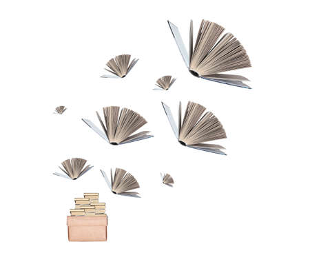 Paper books flying and spreading from box. Reading concept. Surreal composition.の写真素材
