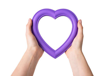 Hands holding heart isolated on white background. Valentines day and love concept. Mock up. High quality photoの写真素材