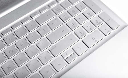 Grey laptop keyboard for entering information, data in computer. High quality photoの写真素材