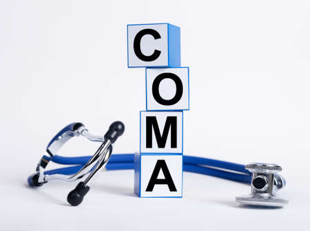 Coma word on medical cubes on white background.の写真素材