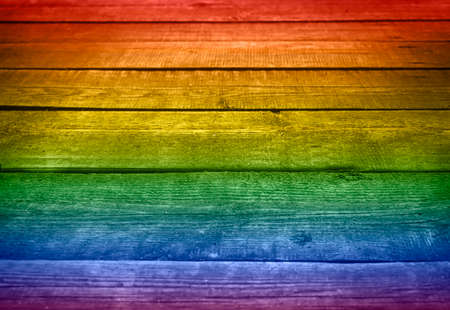 Multicolored boards of rainbow colors. Wooden background. Bright bridge. Pride, freedom LGBT flag. High quality photoの写真素材