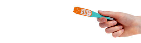 38 celsius high temperature on wood toy thermometer in hand close up. White banner with copy space...