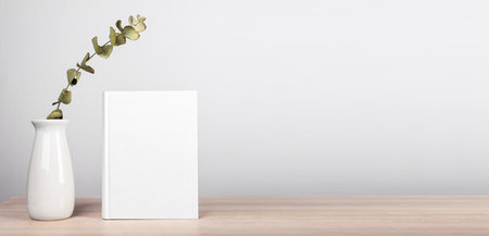 Book mockup with empty white hard cover for literature presentation. Banner with copy space. high quality photoの写真素材
