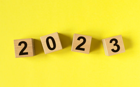 2023 new year on cubes on yellow background. High quality photoの写真素材