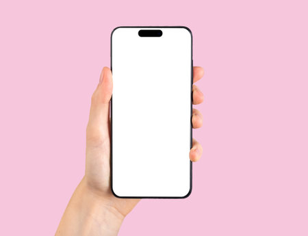 Mobile phone, smartphone mockup, screen display mock up in hand, POV on pink. high quality photoの写真素材