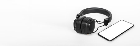 Mobile phone mockup, headphones on banner, ad background. Smar phone screen mock up, template for...