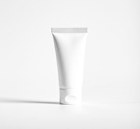 Cosmetic tube mockup on simple white. Clean pure package mock up.の写真素材