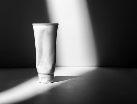 Cream tube, squeezed used wrinkled cosmetic containerの写真素材