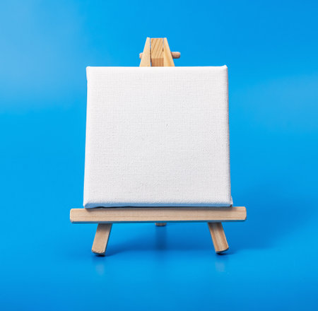 Square canvas on wood easel, mini tripodの写真素材