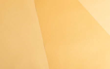 Modern yellow paper background with a smooth texture and subtle gradient. Minimalist and elegant design, perfect for premium overlays, abstract art, and luxurious stationery. Theの写真素材