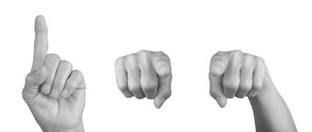 Elderly female hand pointing with index finger, gesture indicating direction or choice, wrinkled skin in grayscale tones, expressive and mature. Isolated on white background.の写真素材