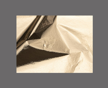 Golden rectangular shape with a polished, metallic surface creates a sleek, modern design. Wrinkled...