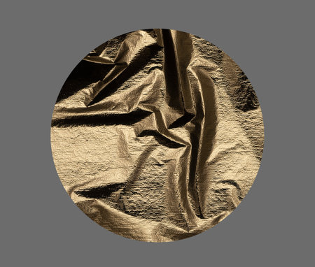 Gold and bronze geometric shapes with crumpled, crinkled, and embossed metallic texture, shiny and...
