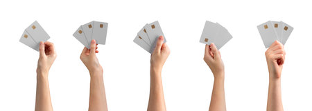 Bank card mockup set. Female hand holding two or three blank gold cards with chip for credit, debit,...